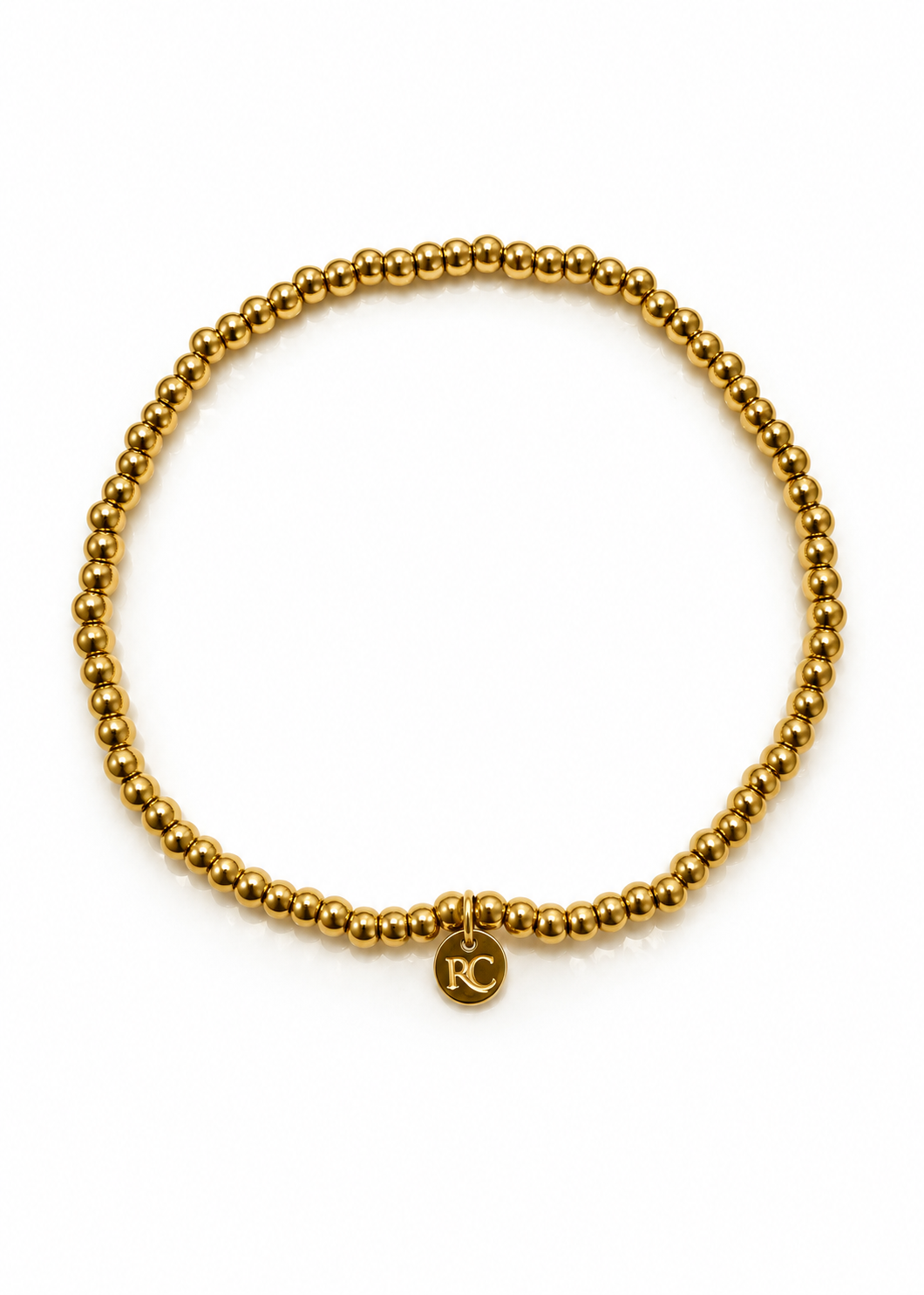3mm Gold Chloe Ann gold beaded bracelet with Rustic Cuff charm, overhead view