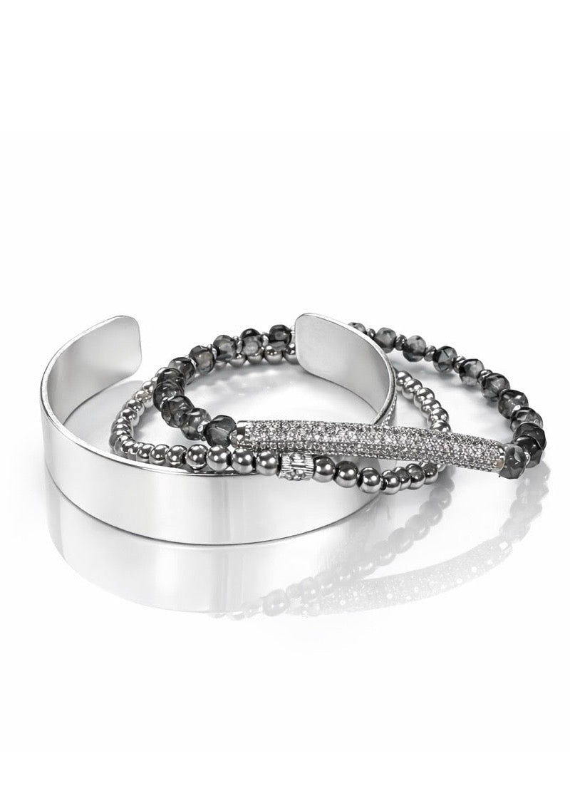 Silver Linings Trio arranged on a white surface