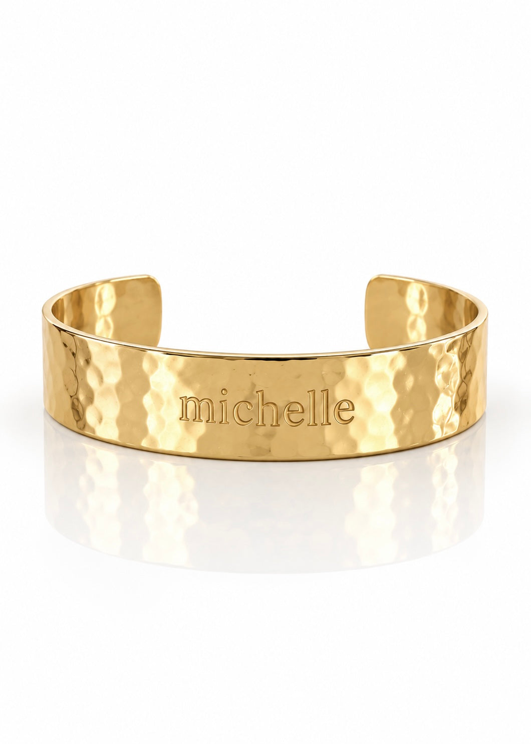 Hammered Engraved Name Cuff in gold on white reflective background