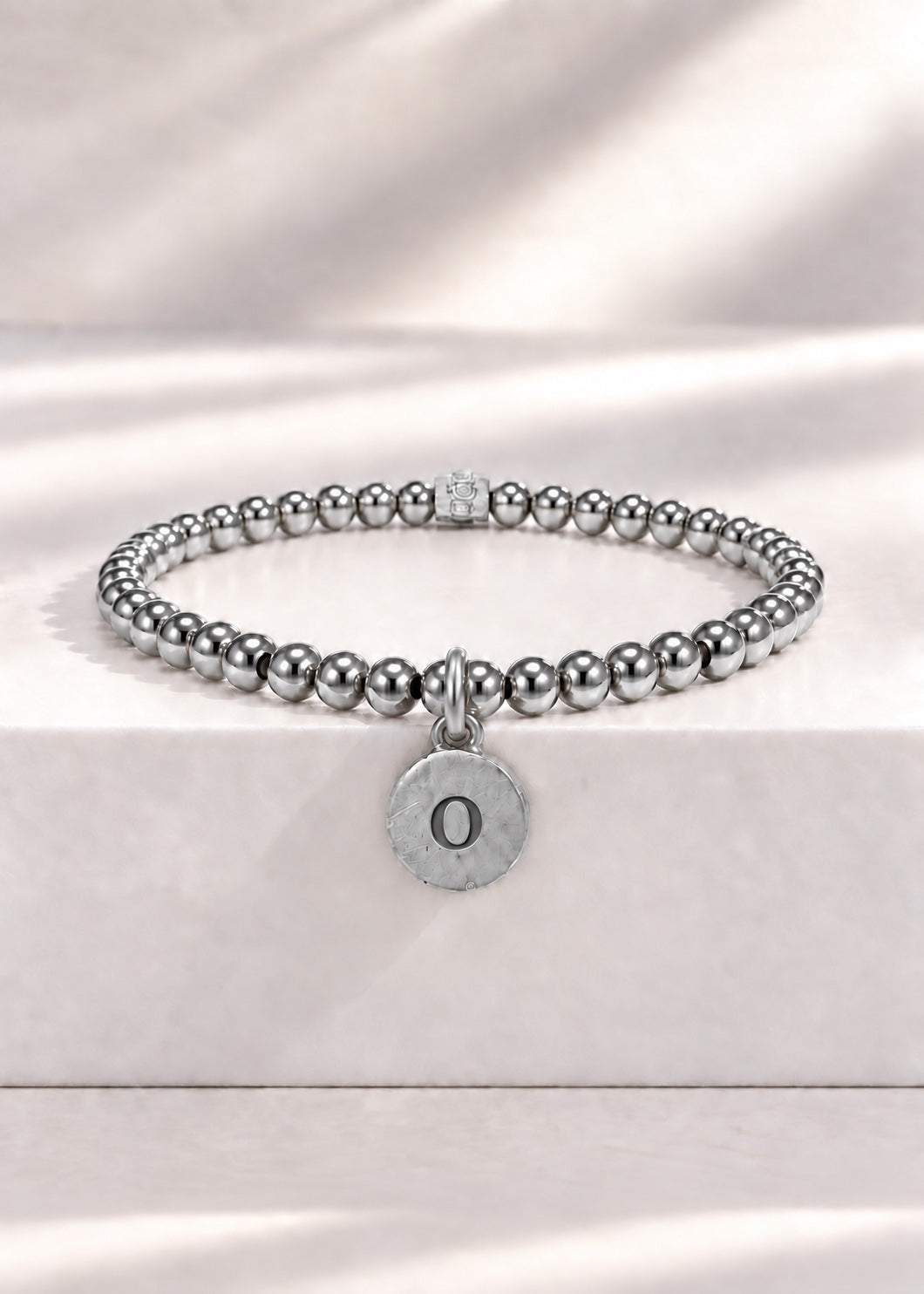 Silver stainless steel beaded bracelet with O initial pendant