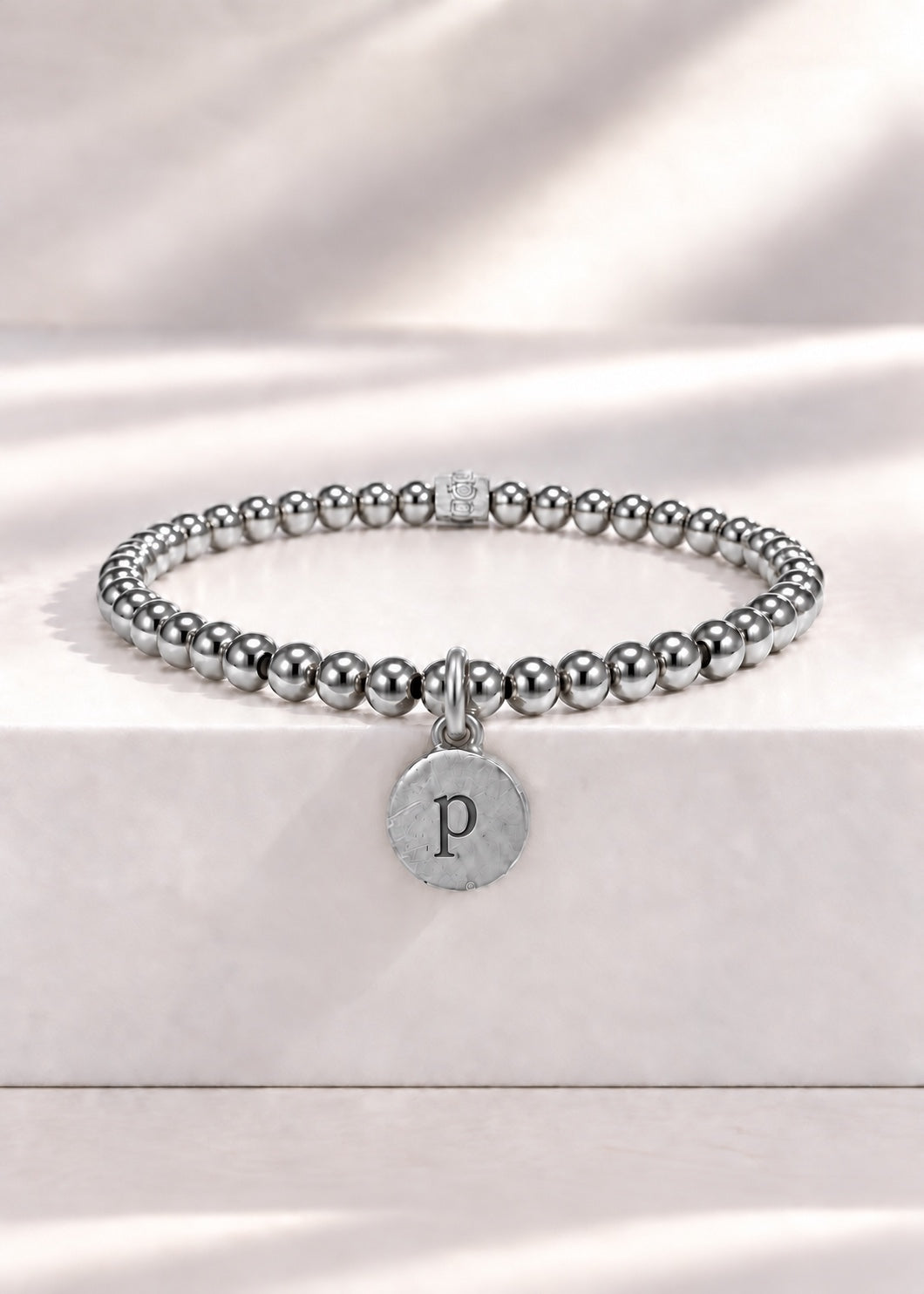 Silver stainless steel beaded bracelet with P initial pendant