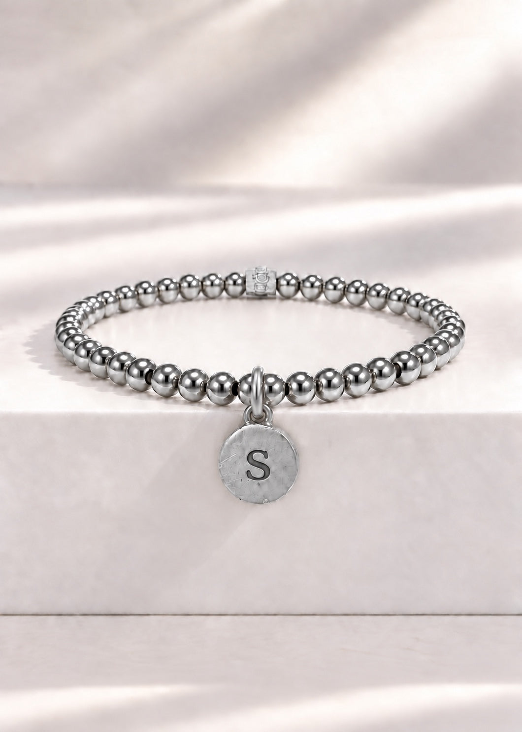 Silver stainless steel beaded bracelet with S initial pendant