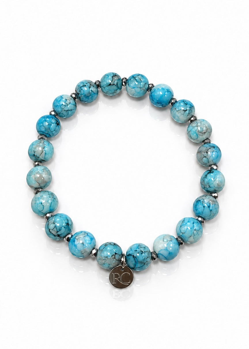 Jasper Lane – Aqua bracelet with silver Rustic Cuff logo charm