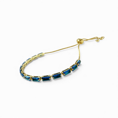 Day 9: Martina Emerald Cut Slider - Blue - Gold + Santa Pouch