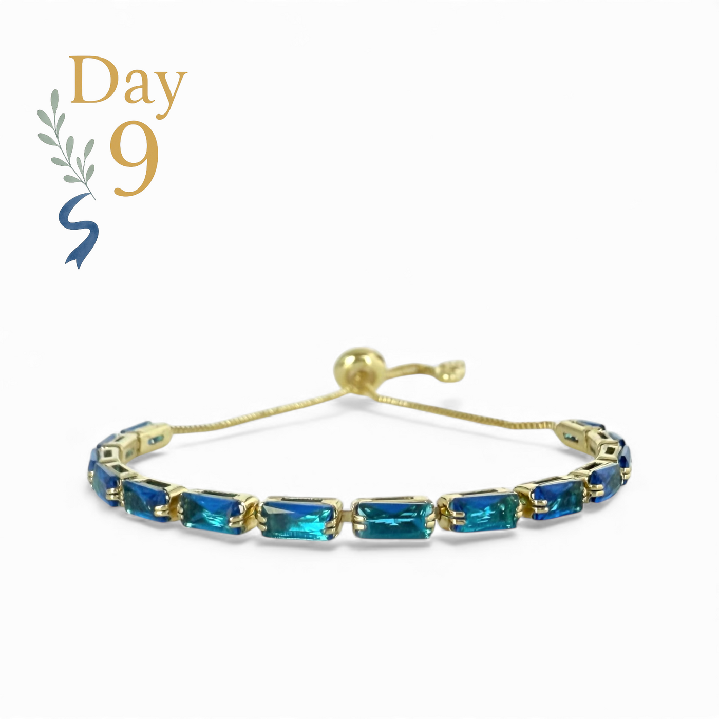 Day 9: Martina Emerald Cut Slider - Blue - Gold + Santa Pouch