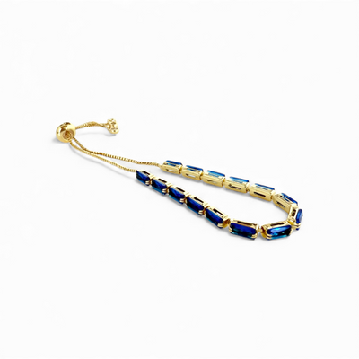 Day 9: Martina Emerald Cut Slider - Blue - Gold + Santa Pouch