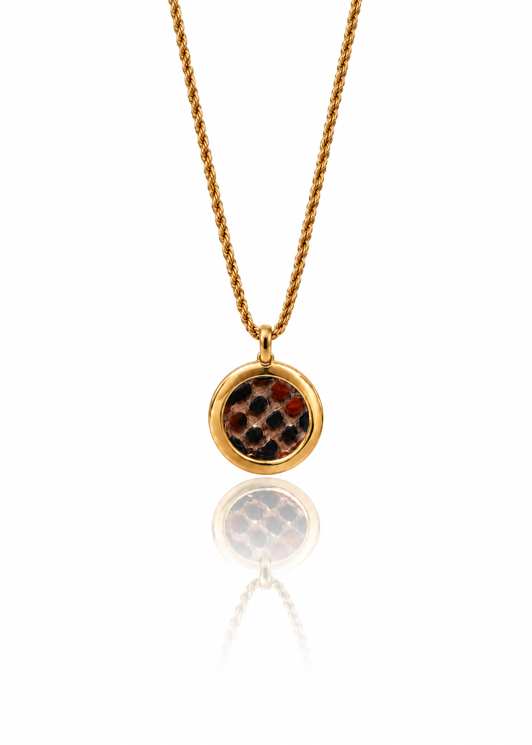 All Dressed Up round brown python pendant on a gold-tone rope-style chain