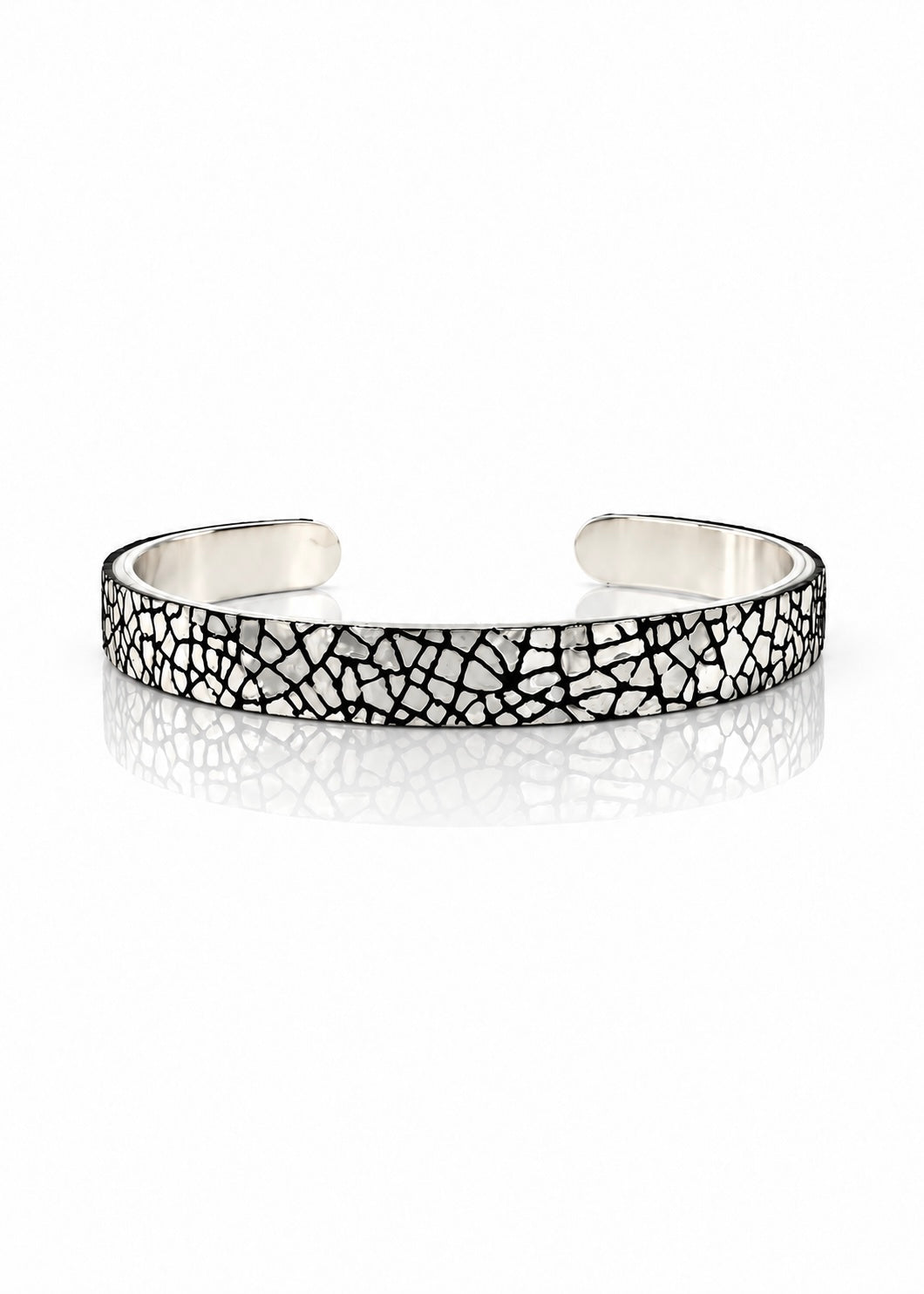 Chrome Crush quarter-inch silver-tone brass cuff with silver-and-black lambskin, front view