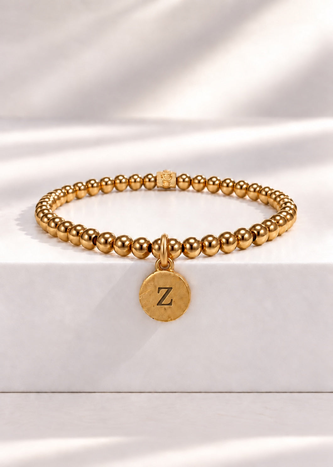 Gold stainless steel beaded bracelet with Z initial pendant