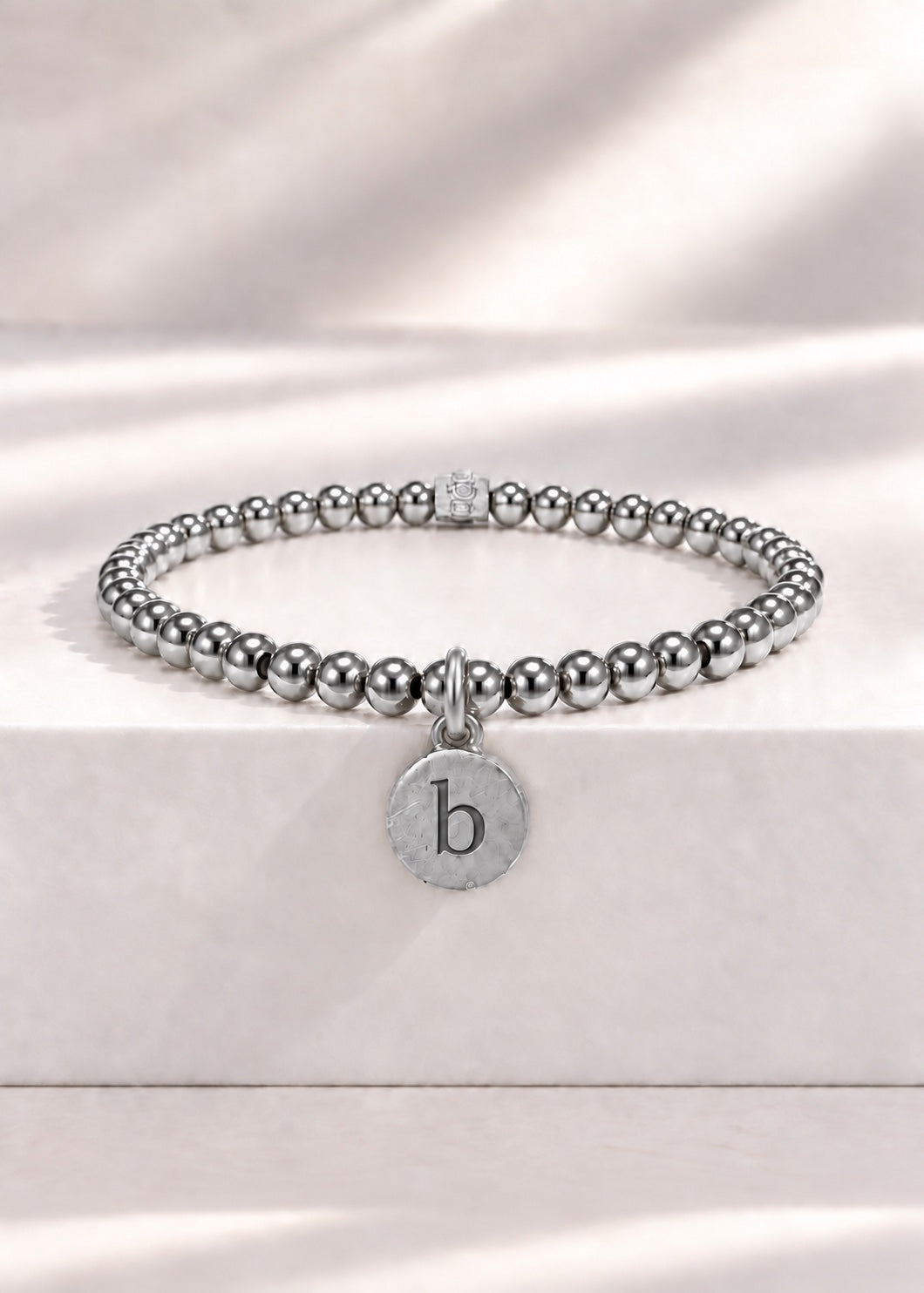 Silver stainless steel beaded bracelet with B initial pendant