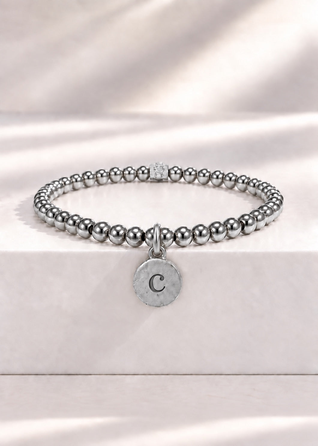 Silver stainless steel beaded bracelet with C initial pendant