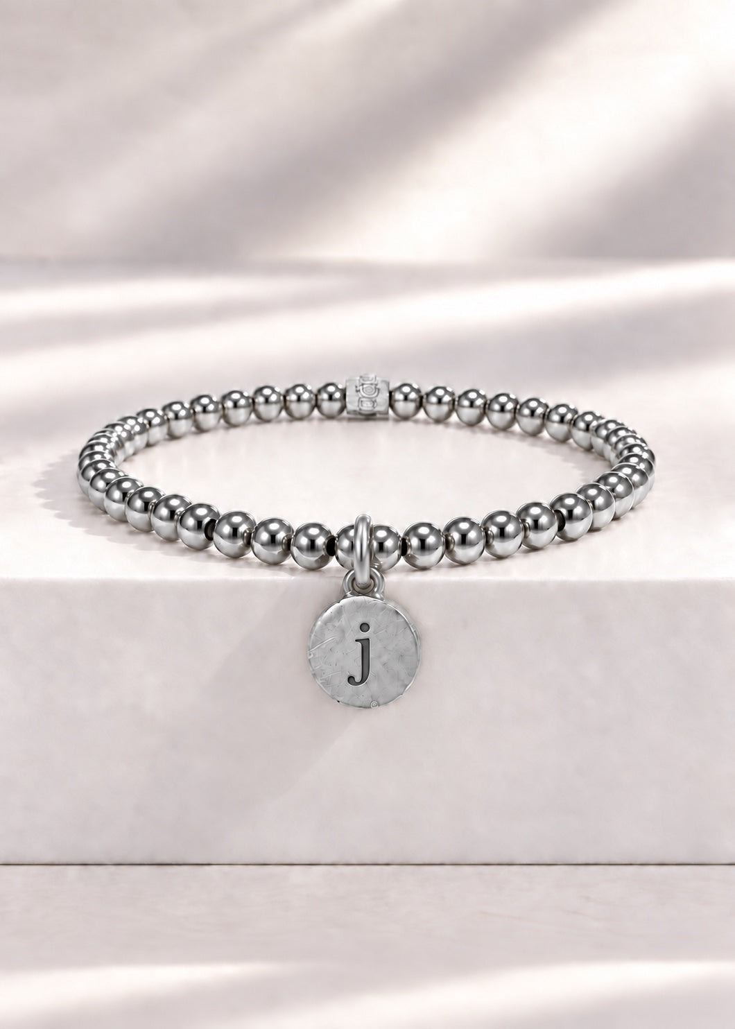 Silver stainless steel beaded bracelet with J initial pendant