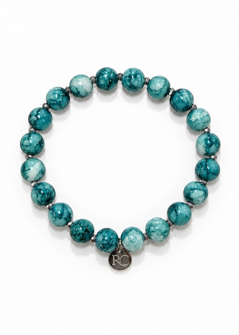 Jasper Lane – Turquoise bracelet with silver Rustic Cuff logo charm