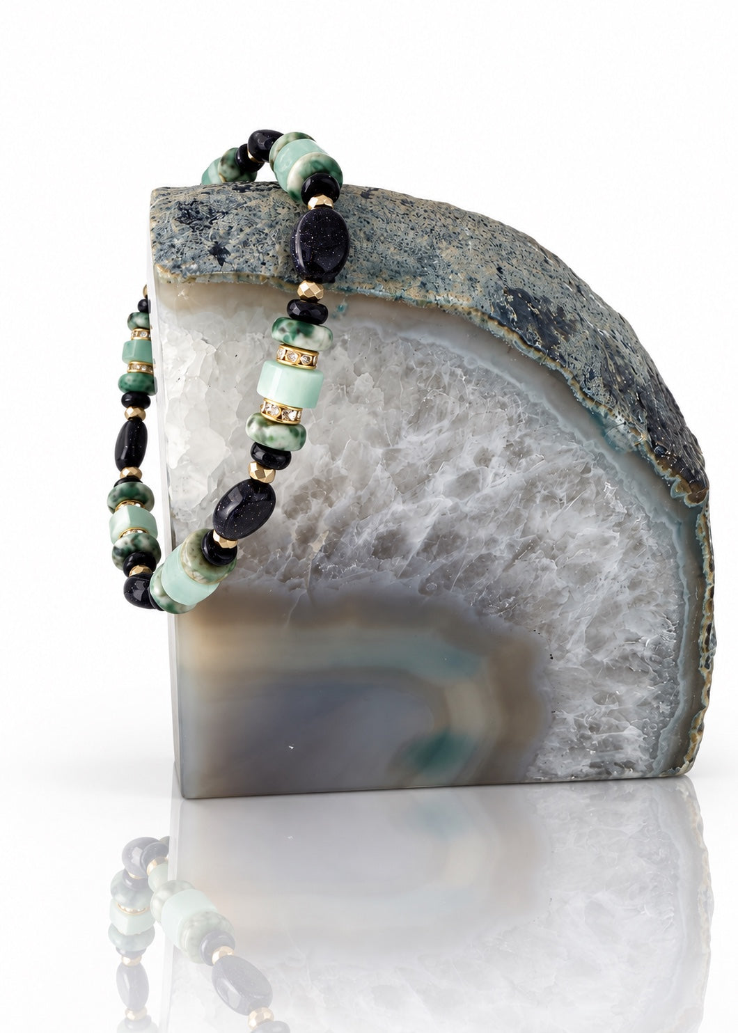 Woodland Blue - Garden Shade bracelet displayed on an agate bookend
