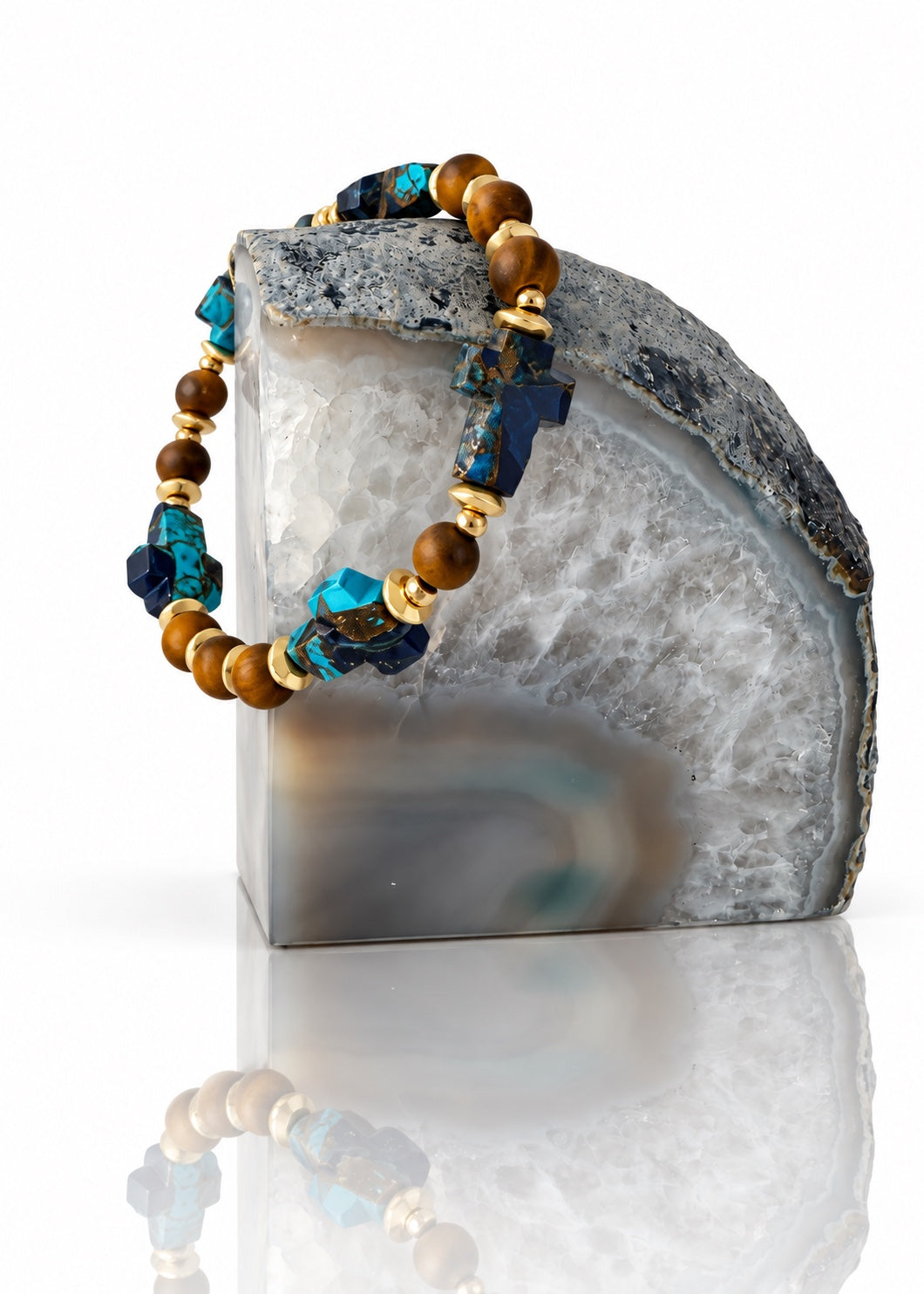 Woodland Blue - Solid Ground bracelet displayed on an agate bookend
